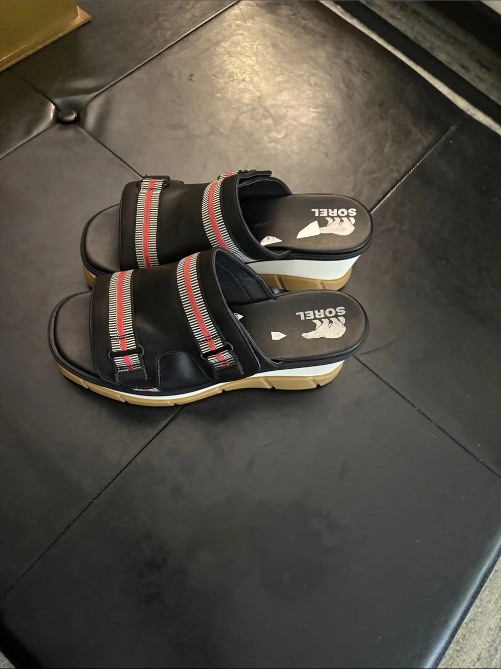 Sorel Black Slide Sandals with Red & White Stripes and Tan Sole
